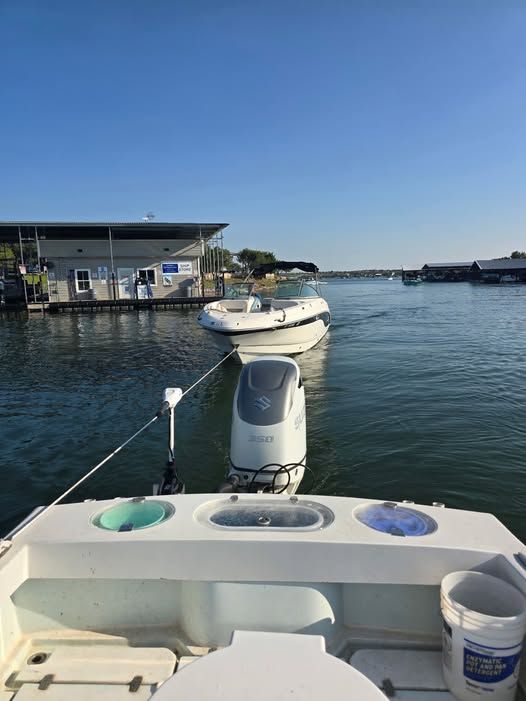 A marina transfer under way on Possum Kingdom Lake on a Sunday evening.